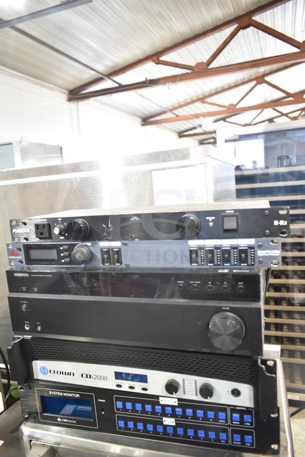 Stack of audio equipment including Furman M-8Lx, dbx Zone Pro 640m, Insignia NS-STR514, Crown CDi2000, and a System Monitor.