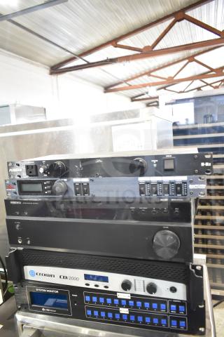 Stack of audio equipment including Furman M-8Lx, dbx Zone Pro 640m, Insignia NS-STR514, Crown CDi2000, and a System Monitor.