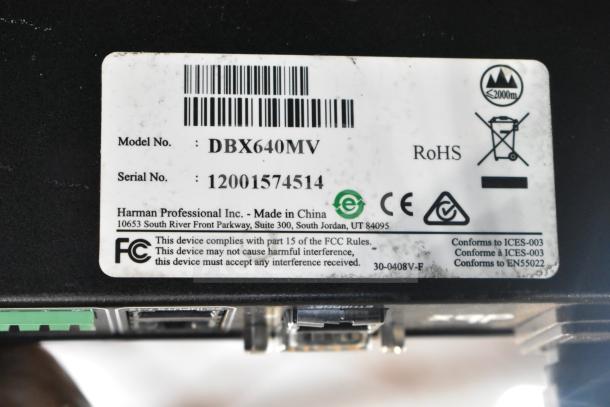 Label on dbx Professional Zone Pro 640m showing Model No. DBX640MV, Serial No. 12001574514, RoHS compliant.