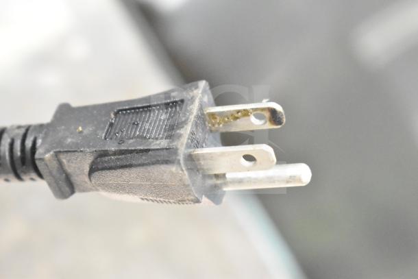 Cosori CO130-AO air fryer toaster oven power plug, 120V, 1 Phase, close-up view showing prongs and cord condition.