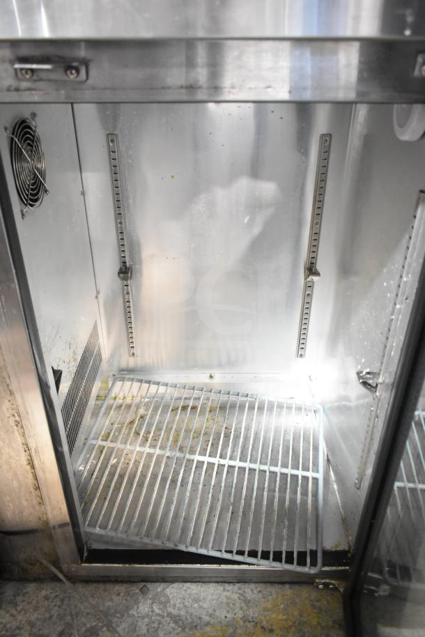 Spartan SGBB-58 Commercial 2 Door Back Bar Cooler, showing interior shelving and fan. Some signs of wear. 115 Volts.