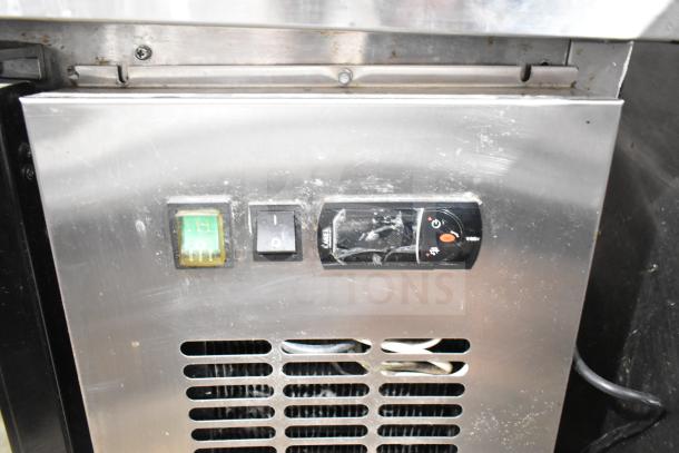 Spartan SGBB-58 Commercial 2 Door Back Bar Cooler control panel, showing power and temperature settings, in used condition.