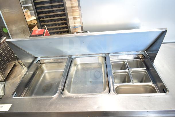 Delfield 4472N-18M prep table with multiple stainless steel pans, mega top design, excellent condition, 115V, 1 phase.