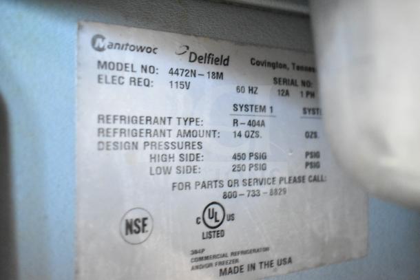 Delfield 4472N-18M prep table label details model, voltage, phase, refrigerant type, design pressures, and certifications.