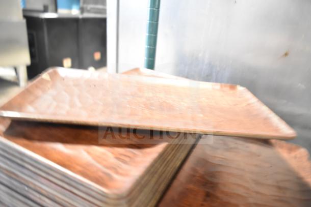 Stack of wooden rectangular plates, light wear, auction lot item with baskets included.