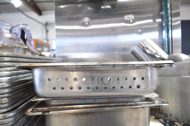 ALL ONE MONEY! Mixed lot with baking pans, stainless steel bins, stock pot, cutting boards, knives, and strainer. Used condition.