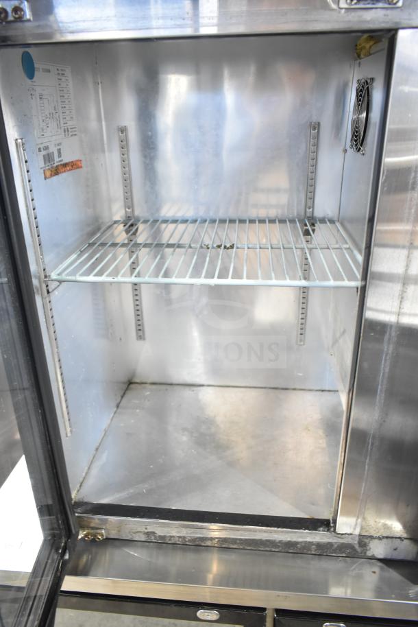 Spartan SGBB-58 commercial 2 door back bar cooler, stainless steel, 115V, 1 phase, interior label visible, moderate wear.
