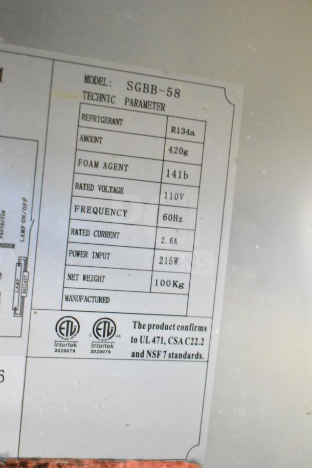 Image of a Spartan SGBB-58 Commercial 2 Door Back Bar Cooler Merchandiser. Tag shows it uses R134a refrigerant, 115V, 1 Phase.
