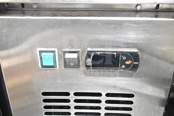 Spartan SGBB-79 Commercial 3 Door Back Bar Cooler control panel with power switches and digital temperature display.