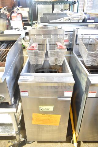 2024 Qualite QL-9/NG floor-style natural gas deep fryer, 90,000 BTU, with two metal baskets. Features durable stainless steel.