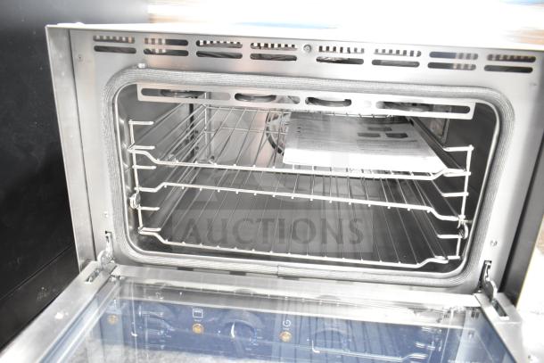 BRAND NEW Vollrath COV-120-HS convection oven, half size. Scratch and dent, missing pane and handle. 120 Volts, 1 Phase.