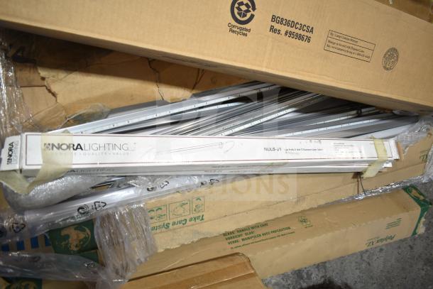 12 Nora Lighting NULS-21 low profile wall fluorescent tube lights in new scratch and dent condition, boxed.