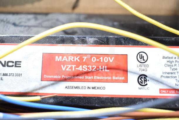 Electronic ballast with label showing "MARK 7 0-10V VZT-4S32-HL," UL listed, assembled in Mexico. Dimmable, programmed start.