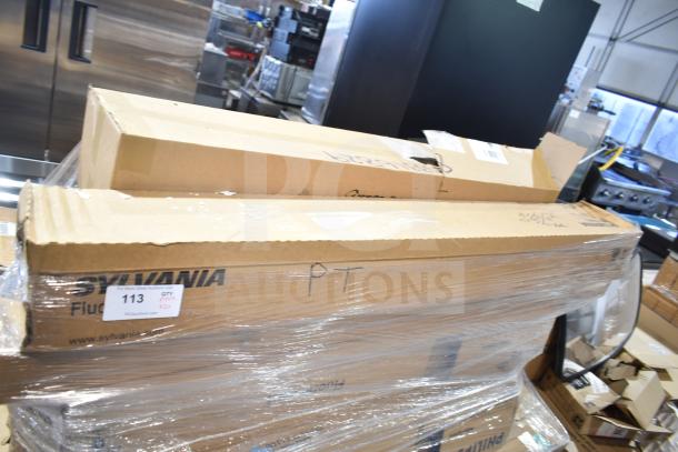 Boxes of brand new scratch and dent GE/Philips fluorescent tube lights, wrapped in plastic, Sylvania branding visible.