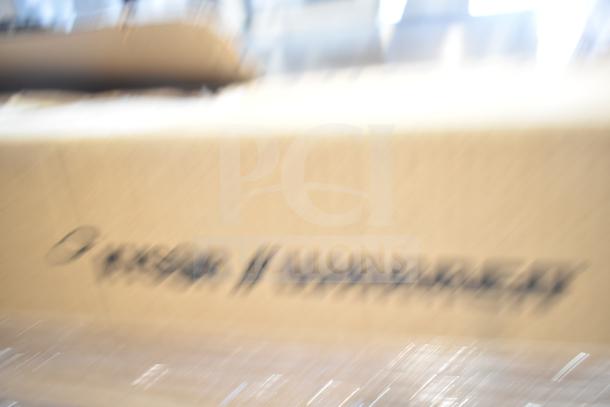 Blurry image of a cardboard box containing brand new GE/Philips fluorescent tube lights. Scratch and dent items.