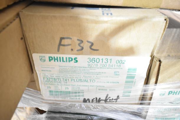 Box of Philips F32T8/TL741 Plus/Alto fluorescent tubes, labeled with model and disposal info, part of a scratch and dent auction lot.