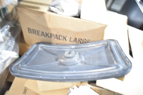 12 new scratch and dent items, including GE ballasts and DualLite LED emergency light back box; large breakpack visible.