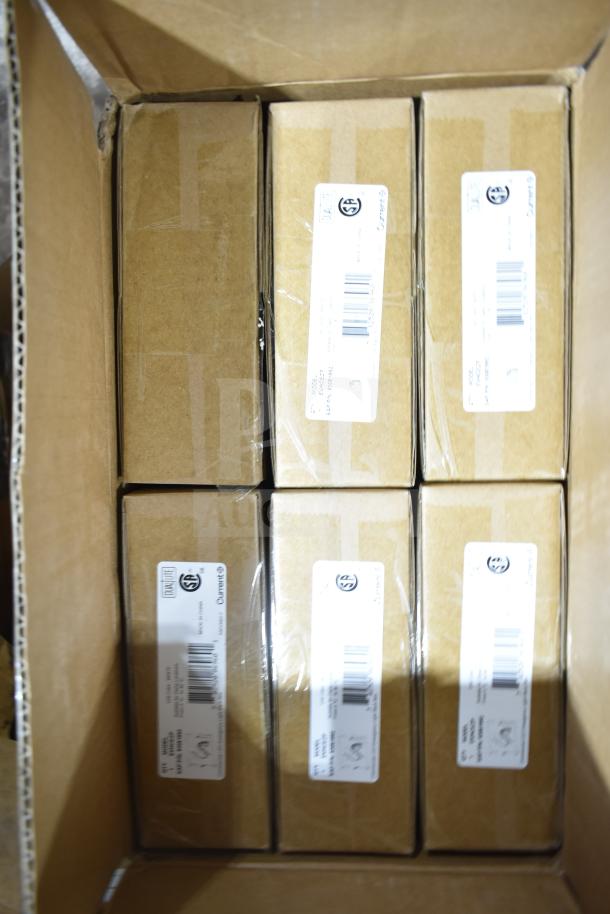 Box containing 12 brand new scratch and dent GE ballasts and DualLite LED emergency light back boxes, labeled and sealed.