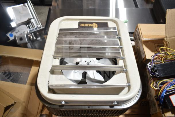 32 brand new scratch and dent items, including metal fan and ballasts. Visible: Qmark label, wiring. Auction lot, condition varies.