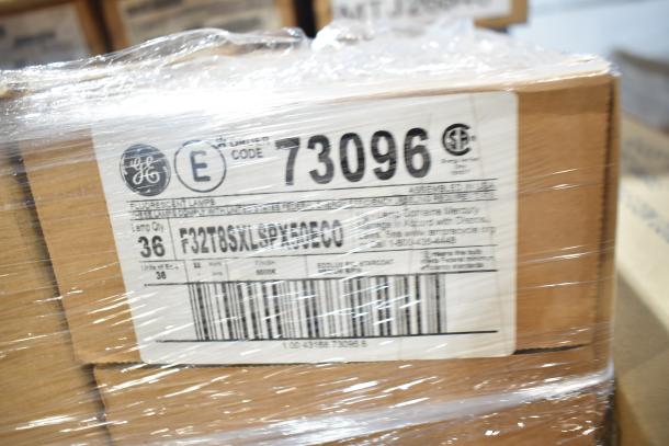 Cardboard box labeled GE fluorescent lamps, code 73096, 36 units, F32T8SKALSPX5000ECO, wrapped in plastic.