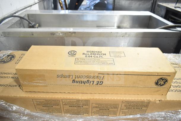 Boxes of GE fluorescent tube lights, new scratch and dent, labeled BG624X2, Res.#4835734, 0.64 Cu.Ft.