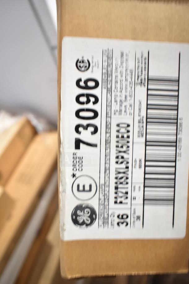 10 new GE fluorescent tube lights with scratch and dent. Box label shows order code 73096.