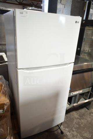 LG LTCS20020W/00 reach-in cooler with freezer, 115 volts, 1 phase, white exterior, visible minor wear.