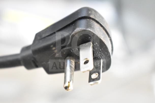 Black electrical plug for Hoshizaki F-330BAJ Ice Machine, 115 Volts, 1 Phase, visible prongs, slightly worn condition.