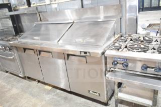 Migali C-SP72-30BT commercial sandwich salad prep table with bain marie mega top. Stainless steel, on casters, 115V, used condition.