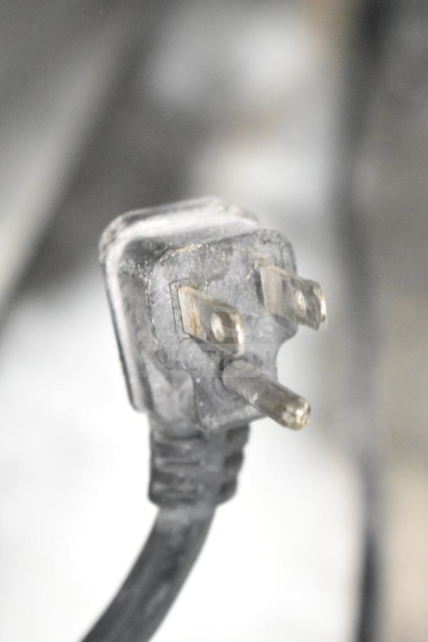 Close-up of a power plug for the 2017 Migali C-SP72-30BT Commercial Sandwich Salad Prep Table, 115 Volts, 1 Phase.