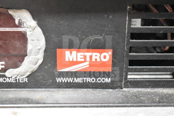 Metro C175-CM2000 Commercial Heated Holding Cabinet, 120V, 1 Phase, on casters. Visible label indicates brand and website.