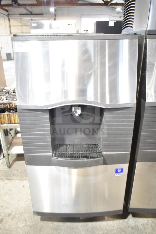 Manitowoc SPA310 commercial ice dispenser, 115 volts, 1 phase, stainless steel, good condition, front view.