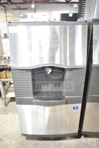 Manitowoc SPA310 commercial ice dispenser, 115 volts, 1 phase, stainless steel, good condition, front view.