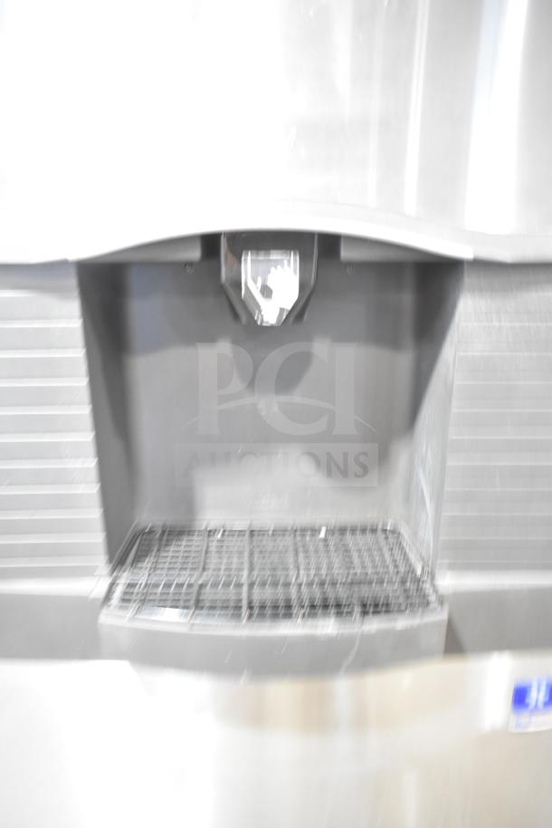 Manitowoc SPA310 commercial hotel ice dispenser, 115V, 1 phase, stainless steel, clean interior, slight surface wear.