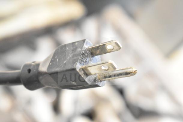 Close-up of the power plug for a Manitowoc SPA310 commercial hotel ice dispenser, 115 volts, 1 phase.