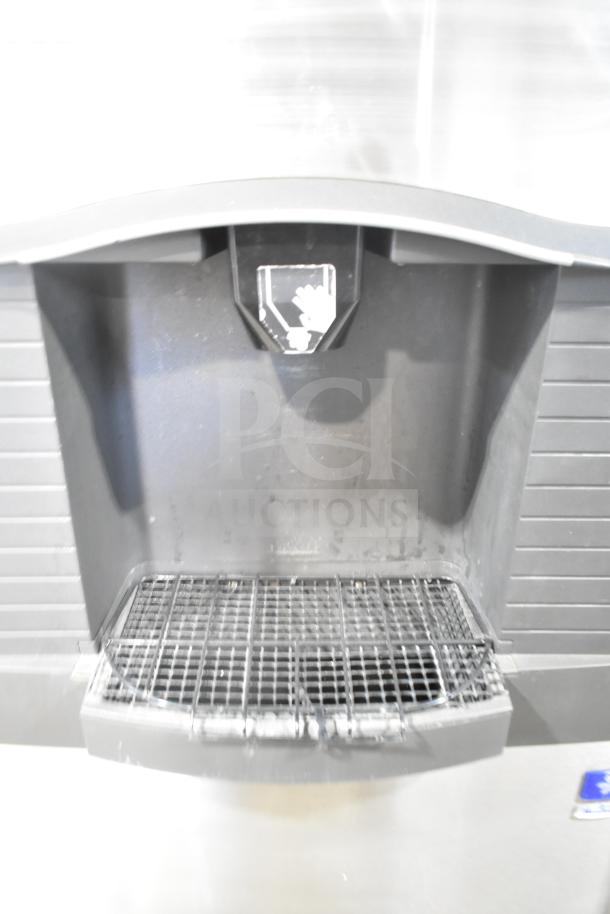 Manitowoc SD0452A Ice Machine Head on SPA310 Dispenser; 115V, 1 Phase. Appears gently used, stainless steel finish, clean exterior.