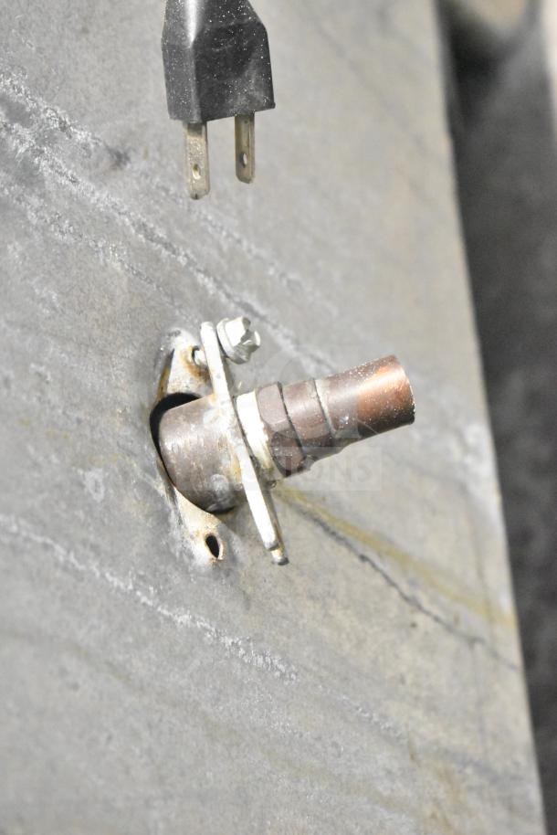 Manitowoc SD0452A ice machine and SPA310 dispenser, 115V, 1-phase. Power cord and plumbing connections visible, good condition.