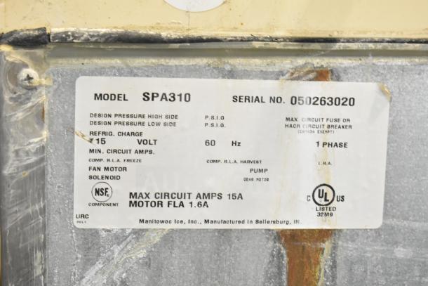 Manitowoc SD0452A Ice Machine Head on SPA310 Dispenser, 115V, 1 Phase. Model SPA310 label with specifications shown.