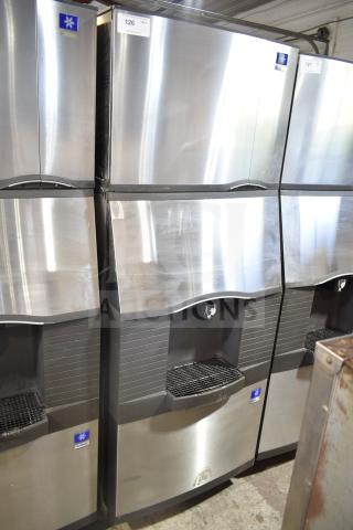 Manitowoc SD0452A commercial ice machine on SPA310 hotel dispenser; stainless steel finish, 115V, 1 phase, with visible logo.