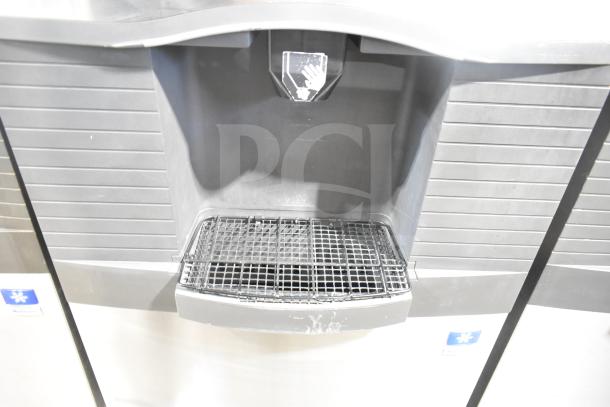 Manitowoc SD0452A ice machine head on Manitowoc SPA310 dispenser, 115V, 1 phase, with visible ice chute and drip tray.