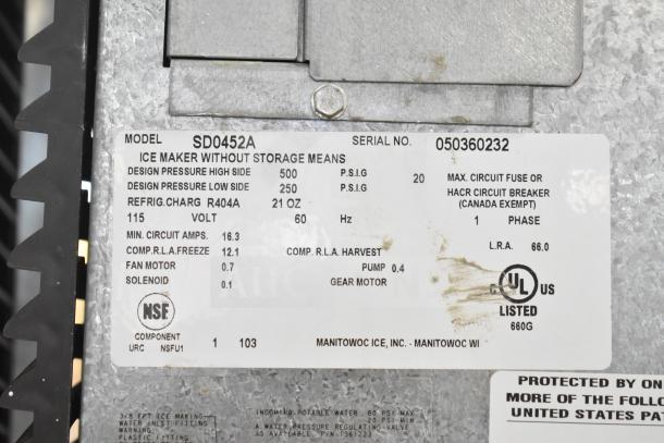 Manitowoc SD0452A Ice Machine head info label, includes model, serial, voltage, and UL listing details.