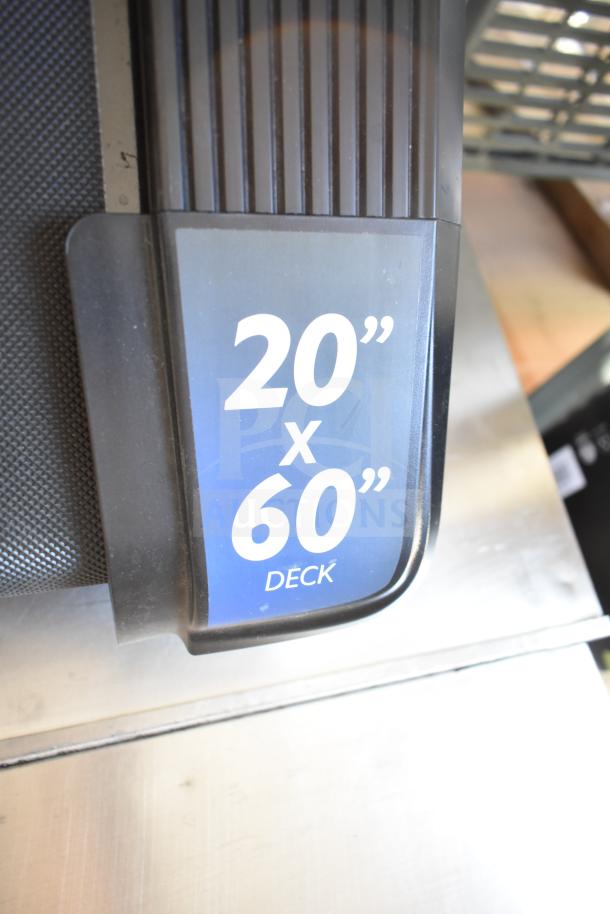 Horizon Folding Treadmill, 20" x 60" deck size, shown in good condition.