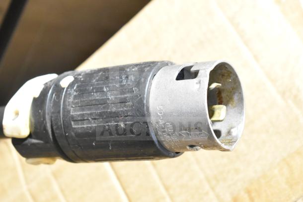 Close-up of electrical connector for the CresCor HU18-671-120 Heated Holding Cabinet, showing Hubbell 50-amp markings.