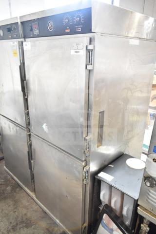 CresCor HU18-671-120 heated holding cabinet on casters. Features dual doors, control panel, commercial use, visible wear.