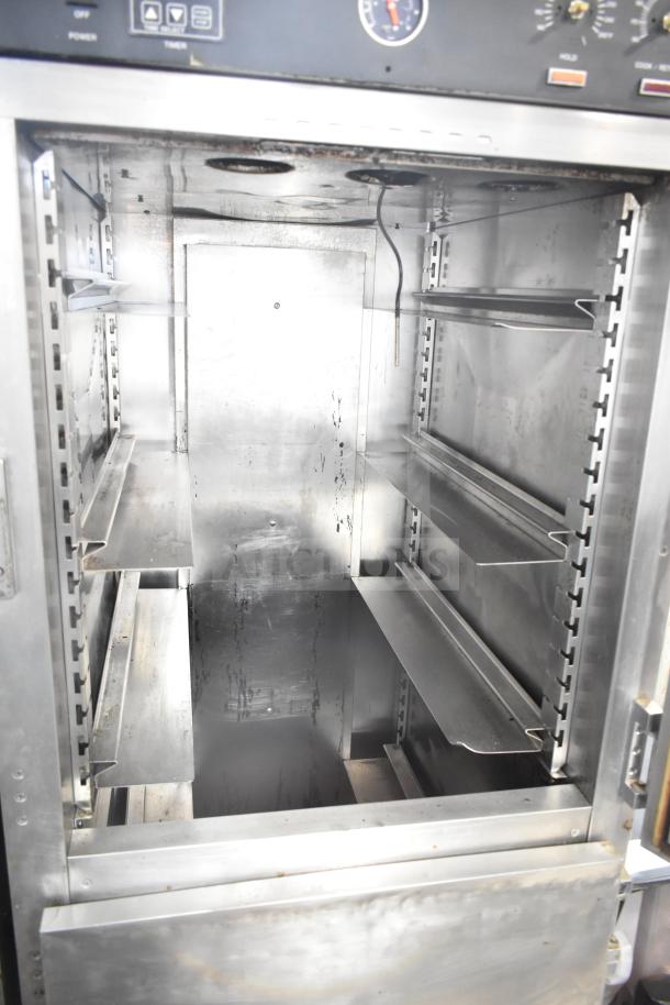 CresCor HU18-671-120 commercial heated holding cabinet with shelves, visible wear, on commercial casters.