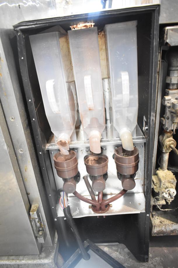 Avantco 177PBD3 powdered cappuccino/hot chocolate machine, 120V, 1-phase. Features three powder containers. Used condition.