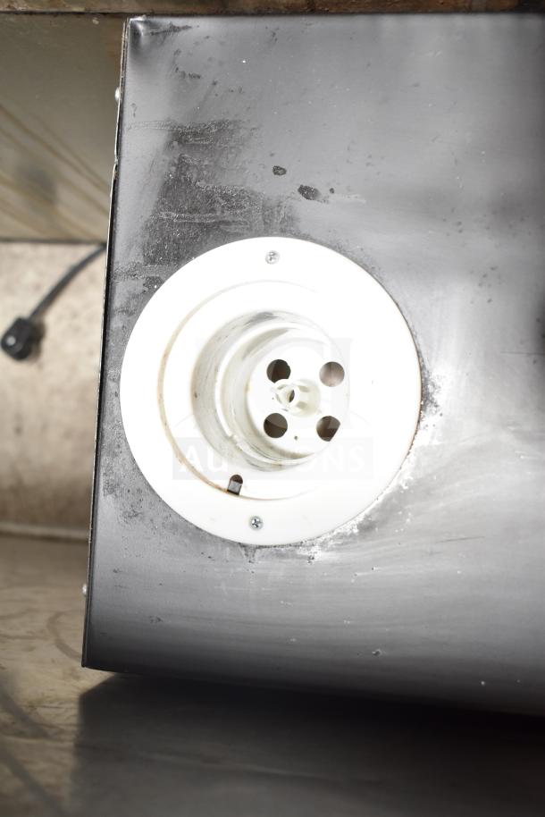 Avantco 177PBD3 cappuccino/hot chocolate machine, 120V, 1 phase. Visible wear, needs cleaning. Base and outlet shown.