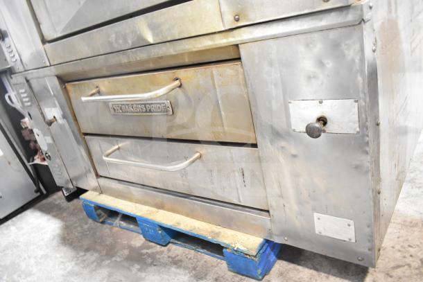 Bakers Pride DS-805 commercial single deck pizza oven, natural gas powered, stainless steel body, fair condition, branded handles.