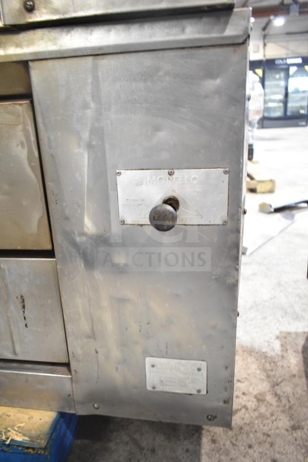 Bakers Pride DS-805 commercial natural gas single deck pizza oven, stainless steel, visible wear, model tag attached.