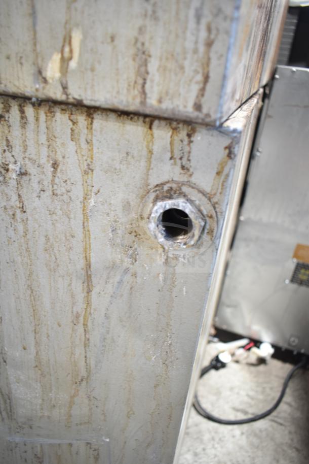 Bakers Pride DS-805 pizza oven, natural gas, single deck, visible wear and tear, commercial-grade equipment.